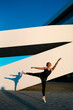© Ezequiel Gim√©nez/Westend61 - Young woman practicing ballet dance against structure