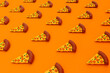 © Giada Canu/Westend61 - Three dimensional render of pizza slices on orange background