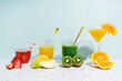© Gemma Ferrando/Westend61 - Healthy fruit juices on terrazzo marble against wall at home