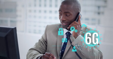 Poster - Composition of 6g text and icons over african american businessman talking on phone in office