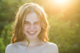 Portrait of smiling teen with natural nude make up. Beauty portrait of beautiful smiling female model. Natural smile.
