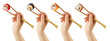 Women's hands hold sushi rolls with sticks. White background. Creative concept. Clipping path.