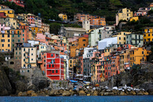 With houses clinging to the slopes of a steep mountain, Riomaggiore in Cinque Terre, Italy, is a mecca for hikers and trekkers.