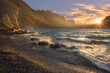 © Tandem Stock - Fierce winds provoke crashing waves on the shore of St. Mary's Lake at sunset.