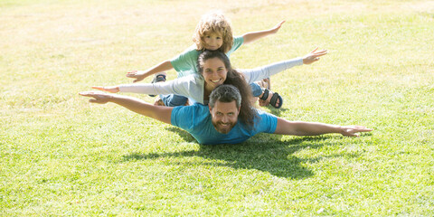 Sticker - Family and child outdoors in spring nature. Banner panorama with copy space for text.