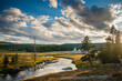© Tandem Stock - A peaceful moment along the Firehole River as it passes through Upper Geyser Basin in Yellowstone National Park.