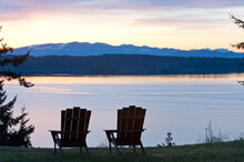 The Sun Rises Behind The North Cascades From The Bluffs Bed And Breakfast, Whidbey Island, WA