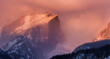 © Tandem Stock - Hallet Peak, in Rocky Mountain National Park, at sunrise as a winter snowstorm is beginning to affect the mountains along the Front Range.
