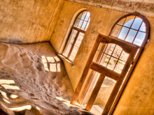 House Filled With Desert Sand In Ghost Town Of Early Diamond Mining Town Of Kolmanskop, Namibia
