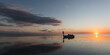 © Tandem Stock - A boater uses a push pole to navigate the mangrove flats of Florida Bay within Everglades National Park, Florida.