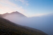 © Tandem Stock - Low clouds obscure the summit of Fugleberget in Hornsund, Svalbard.