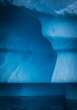 © Tandem Stock - Different shades of blue of an iceberg in Antarctica.