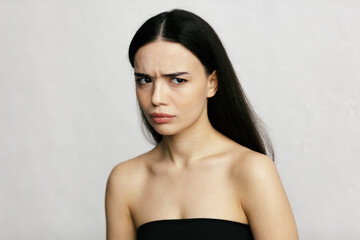 Young beautiful woman face close-up