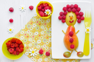 Canvas Print - Edible funny man from fresh fruits and berries, food art for kids