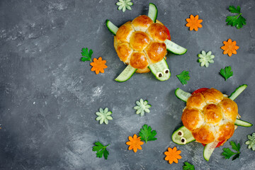 Wall Mural - Turtle sandwich - creative idea for kids lunch, fun animal burger shaped cute turtle