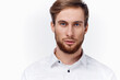 © SHOTPRIME STUDIO - blond man with a thick beard and mustache in a white shirt on a light background