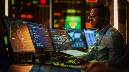 Aufkleber - Professional IT Technical Support Specialist and Software Developer Working on Computer in Monitoring Control Room with Digital Screens. Employee Use Headphones with Mic and Talking on a Call.