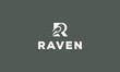 Letter R With Raven In Negative Space logo vector icon illustration