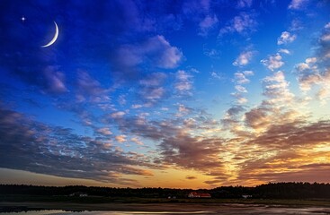 Wall Mural - moon with beautiful sunset background