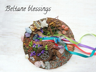 Sticker - Beltane blessings. Wiccan altar for Beltane sabbath. spring pagan festive ritual. wheel of the year with ribbons, gemstones, flowers, pentagram, candle - symbol of celtic holiday, spring season