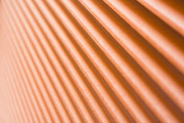 Brown metal shutters at the windows. Close up view