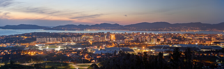 Wall Mural - Panoramic view of a beautiful sunset over the city of Vigo in Galicia, Spain