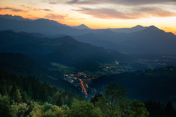 Poster - Beautiful sunset over mountains with storm clouds in the background