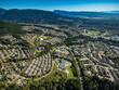 Stock aerial photo of housing developmement Westwood Plateau BC, Canada