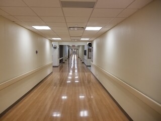 Empty Hospital Corridor with Handrails, Bright Lights