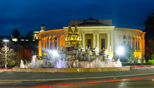 Night View Of Grandiose Composition Of Colchis Fountain On Main Square Of Kutaisi On Background Of Lado Meskhishvili State Academic Theatre In Spring, Georgia