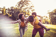 © liderina - African American family having fun outdoors.
