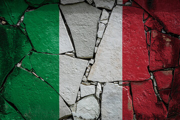 Wall Mural - National flag of Italy. depicting in paint colors on an old stone wall. Flag  banner on broken  wall background.