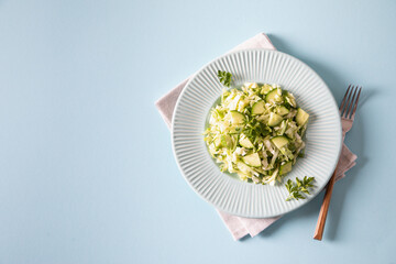 Wall Mural - Healthy salad. Detox Spring vegan salad with cabbage, cucumber, green onion and parsley