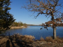 Beautiful View Of Lake Murray Framed By Trees In Autumn, Lake Murray State Park In Oklahoma.