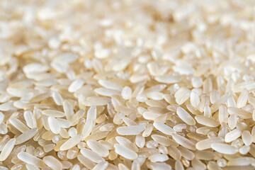 Wall Mural - White rice grains background or texture. Gluten-Free and healthy vegeterian food.