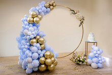 Photo Zone With Arch, Balloons, Flowers And Cake On Birthday Party