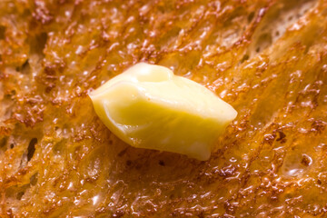 Poster - Melting butter on a slice of toast