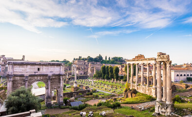 Canvas Print - Sunrise light with blue sky on Roman ancient architecture in Rome, Italy