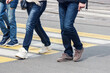 © Radnatt - pedestrians cross the street at a pedestrian crossing