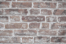 Brown Brick Wall With Scratches, Cracks, Dust, Crevices, Roughness. Can Be Used As A Poster Or Background For Design.