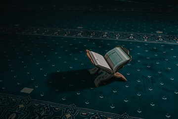 Quran holy book of muslim clouse up in mosque 