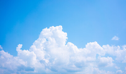 Wall Mural - White cloud with blue sky background.
