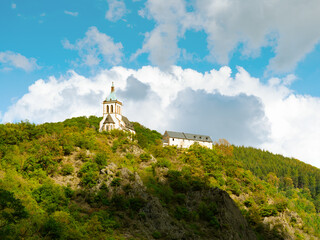 church on the mountain on a background of cloudy sky