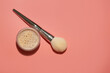 cosmetic brush with beige setting powder