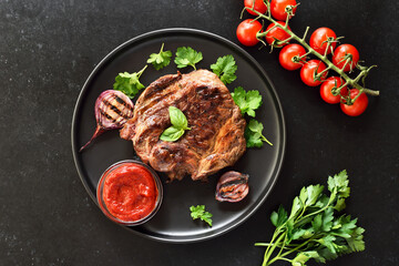 Fried beef steak and tomato sauce