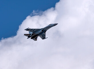 Wall Mural - MOSCOW, RUSSIA - MAY 7, 2021: Avia parade in Moscow. jet fighter aircraft Su-35 in the sky on parade of Victory in World War II in Moscow, Russia