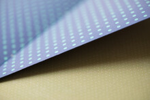 Fancy Blue And Green Scrapbooking Paper Photographed Using A Macro Lens, Featuring A Shallow Depth Of Field