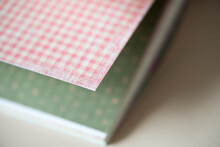 Stack Of Plaid Pink And Green Scrapbooking Paper Photographed Using A Macro Lens, Featuring A Shallow Depth Of Field