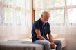 © CandyRetriever  - Depressed Caucasian senior man sit on the bed and looking down in bedroom. Loneliness elderly male living alone at home with sadness worry about health problem. Retirement mental health care concept