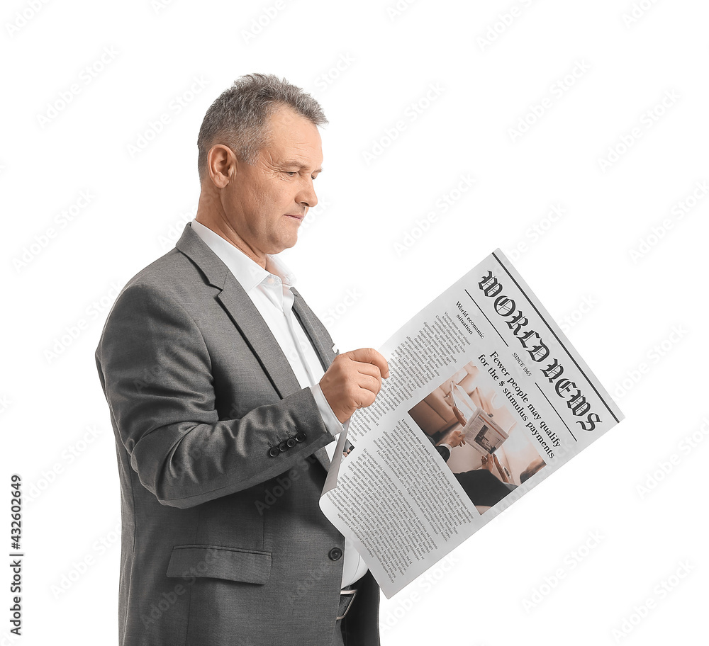 Mature businessman with newspaper on white background